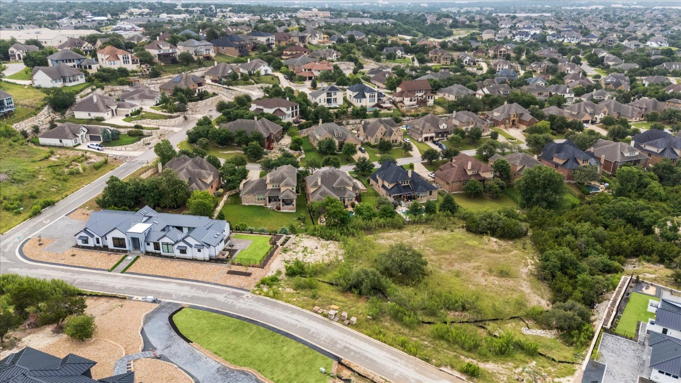 2020 Mesita Way Leander, TX 78641 - Photo 3 of 12 an aerial view of a house with a yard basket ball court and outdoor seating