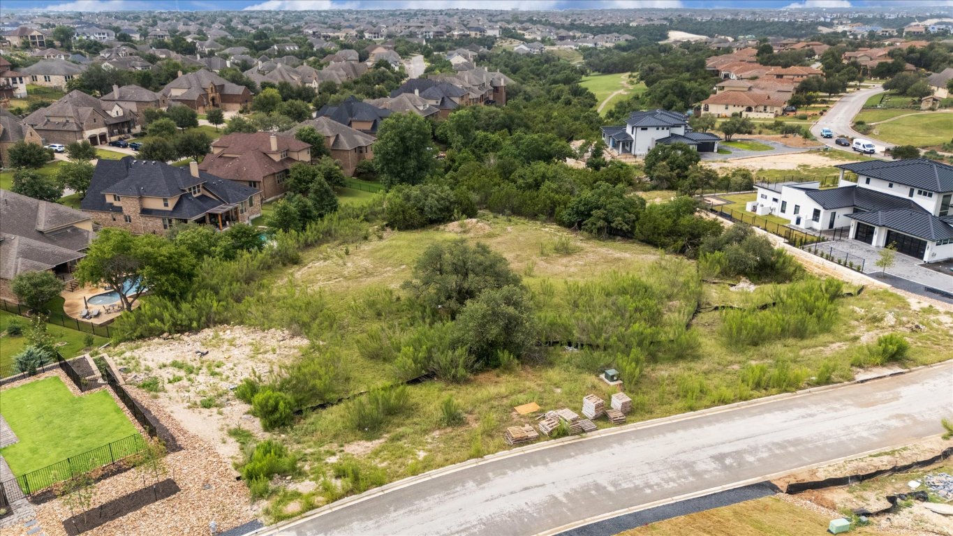 2020 Mesita Way Leander, TX 78641 - Photo 6 of 12 an aerial view of residential houses with city view