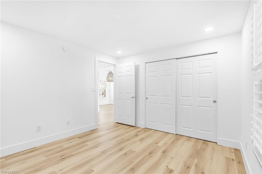 661 Windsor Square, Unit 101 Naples, FL 34104 - Photo 24 of 40 a view of an empty room