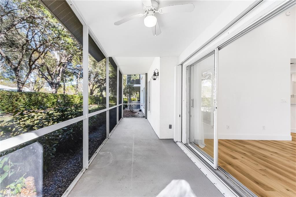 661 Windsor Square, Unit 101 Naples, FL 34104 - Photo 27 of 40 a view of a balcony