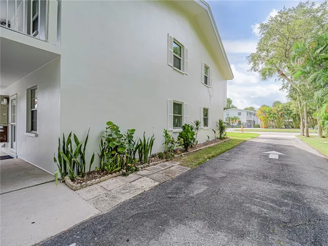 a view of a house with a street