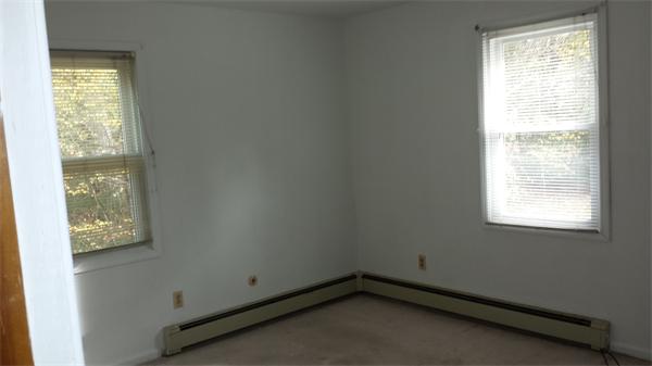 35 Mason Road Freetown, MA 02717 - Photo 7 of 16 a room with window and an empty room