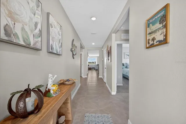 a bedroom with a bed couch and window