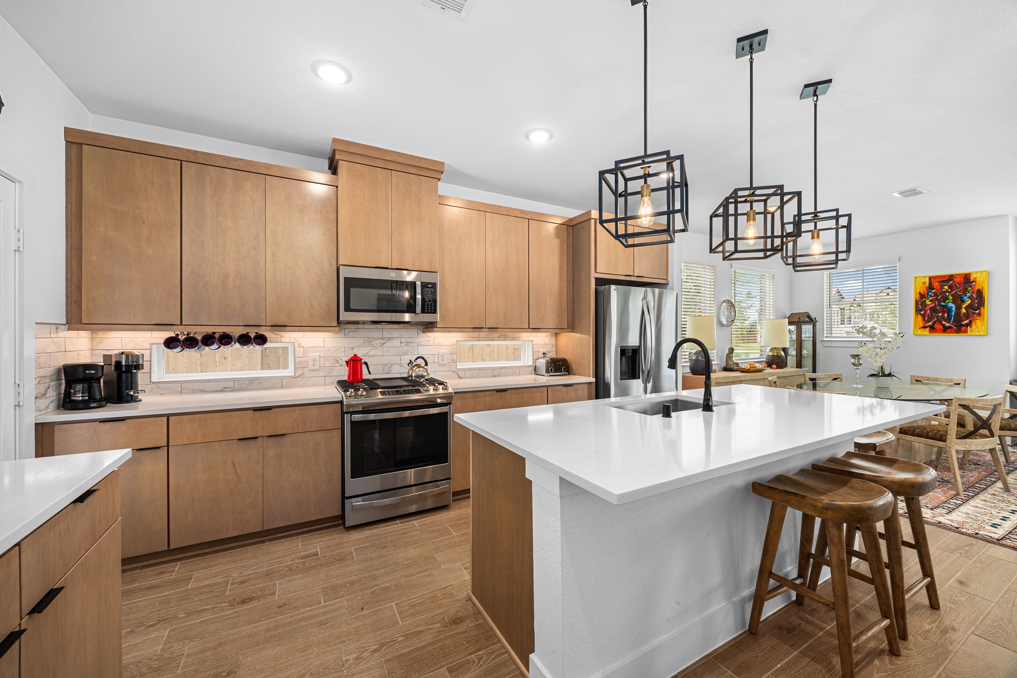 7618 Redbud Orchard Road Katy, TX 77493 - Photo 9 of 26 Don't miss the large pantry to the left of the back door when you visit this home in person. If you need lots of storage space in your kitchen, this is the home for you!