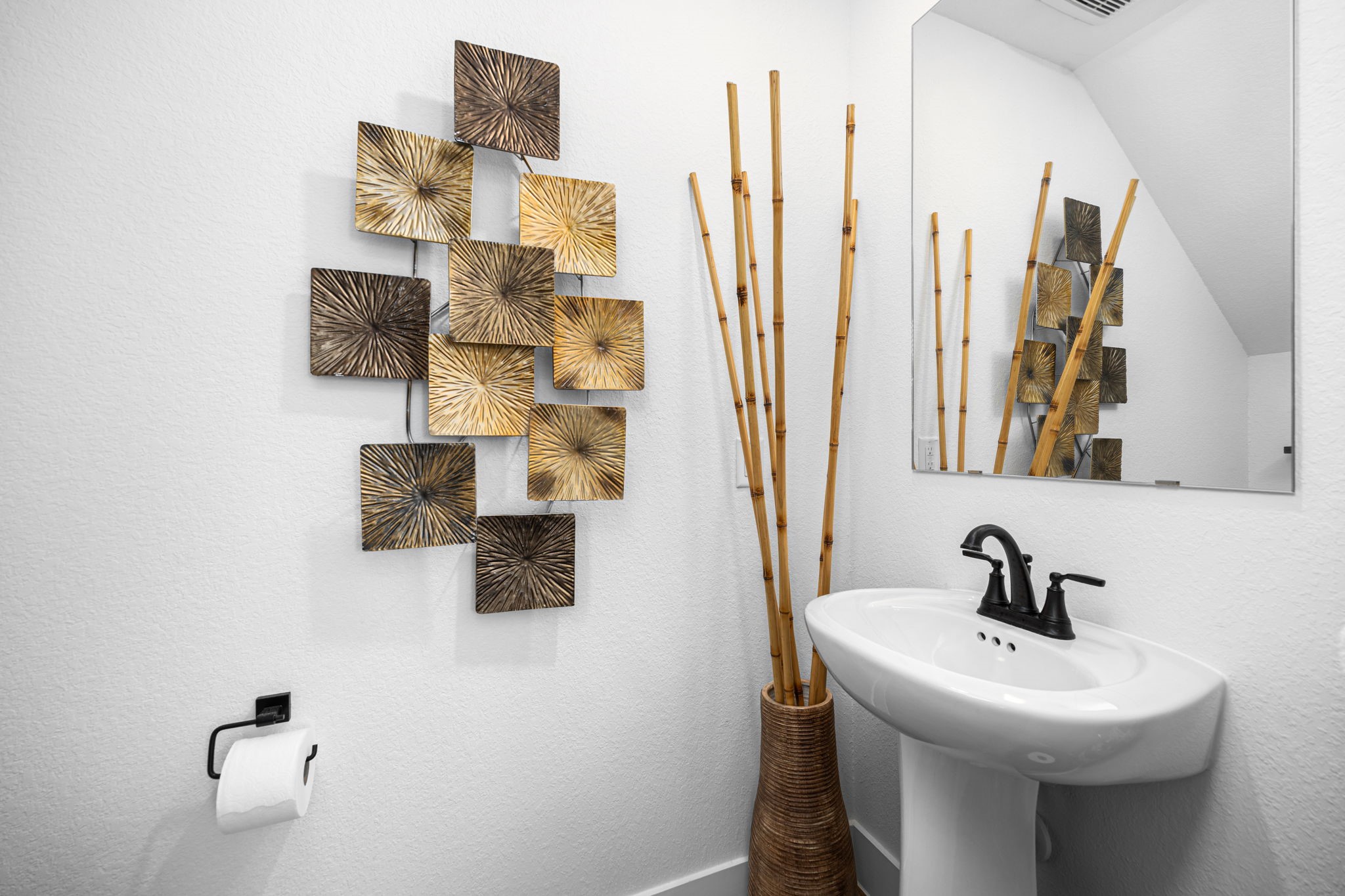 7618 Redbud Orchard Road Katy, TX 77493 - Photo 10 of 26 The powder room is located on the first floor for guest access, leaving the second floor's privacy intact for residents.