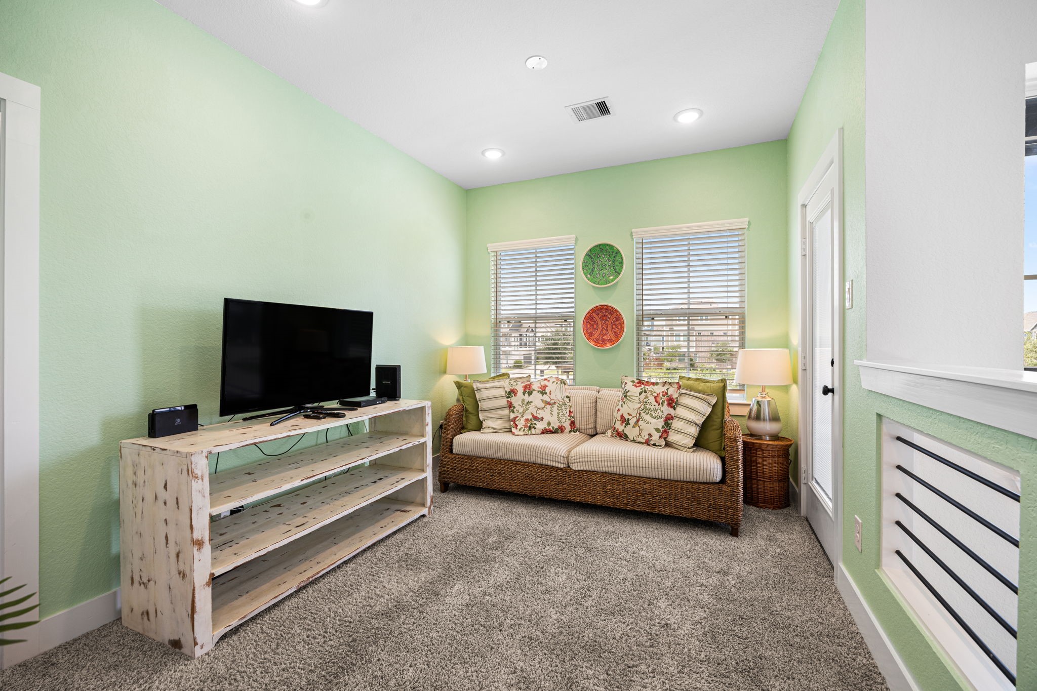 7618 Redbud Orchard Road Katy, TX 77493 - Photo 11 of 26 The upstairs loft/gameroom opens onto the balcon. This flexible space could be trnaformed into a home office, yoga studio, etc.