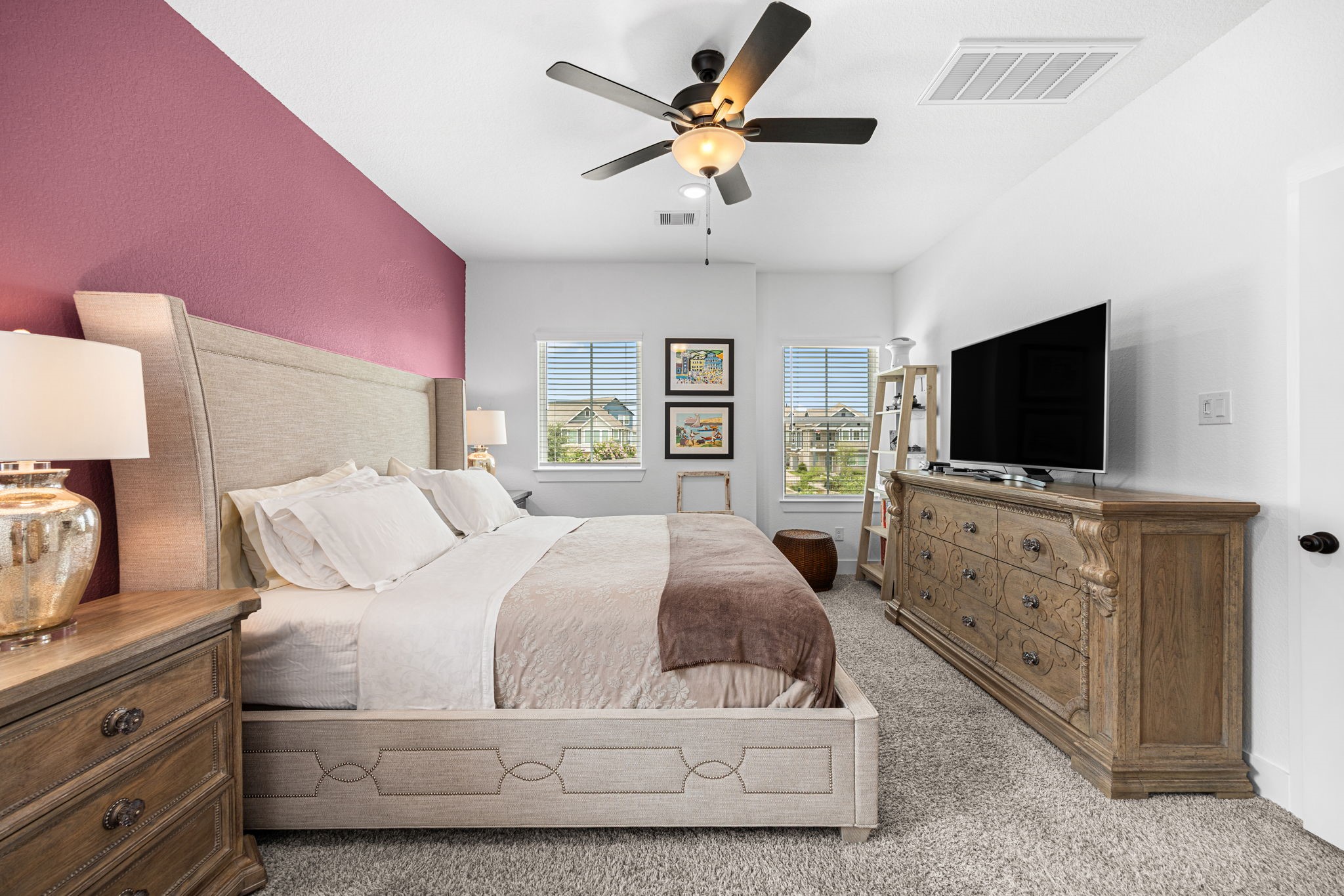 7618 Redbud Orchard Road Katy, TX 77493 - Photo 13 of 26 Located on the second floor, the primary bedroom is proportioned for King-sized furniture.