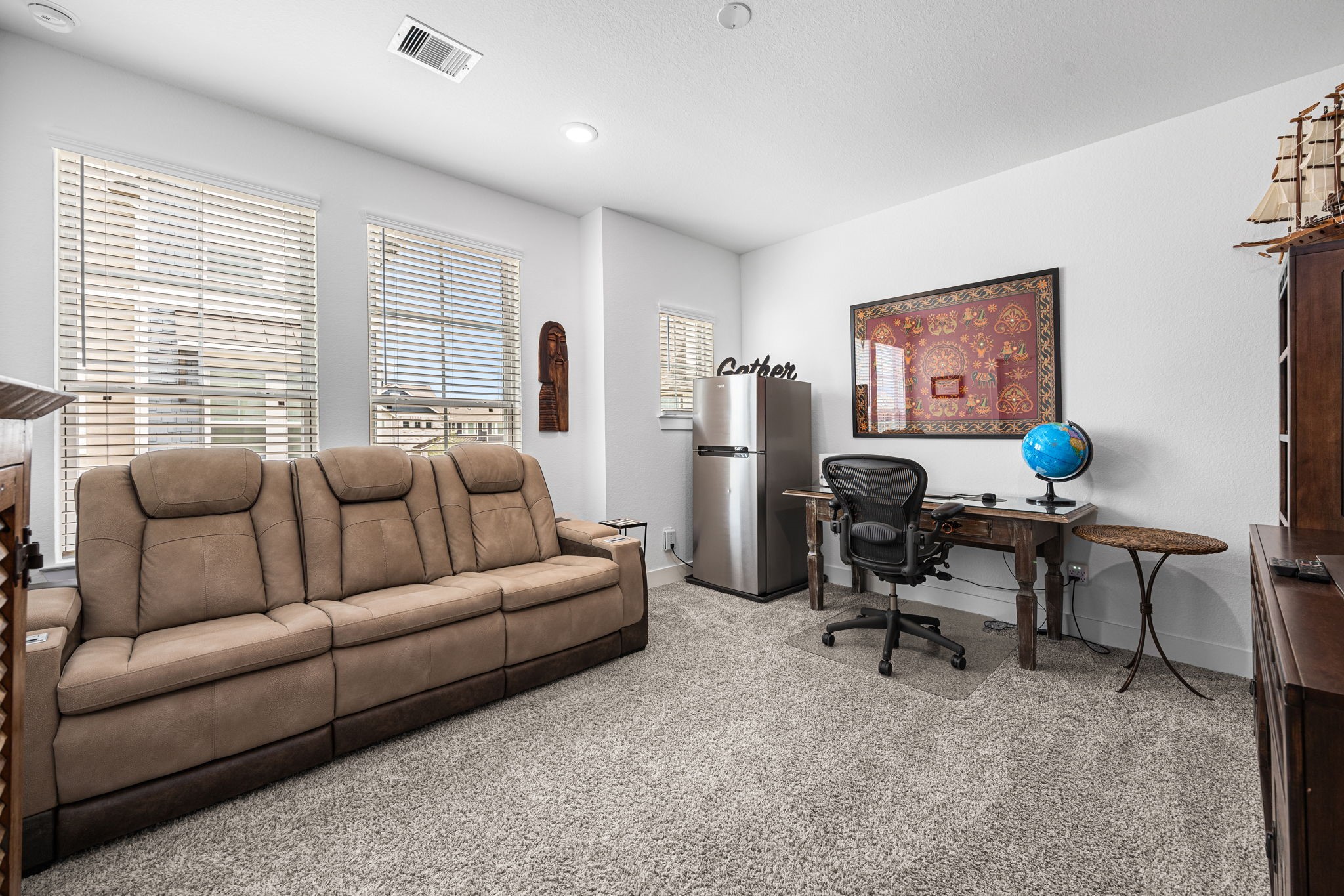 7618 Redbud Orchard Road Katy, TX 77493 - Photo 17 of 26 Bedroom #2 is the larger of the secondary bedrooms. Currently being used as a home office and lounge, this room can easily accommodate Queen-sized furnishings.
