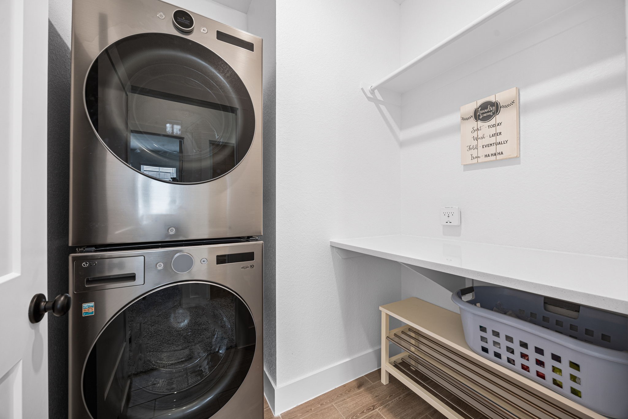 7618 Redbud Orchard Road Katy, TX 77493 - Photo 20 of 26 Ideally located on the second floor for easy access from the bedrooms, this laundry room is a prime example of how to make the most of the space in a functional room. With countetops and a hanging rod, this utility room can be used for folding laundry before it even leaves the room, or could be used as a second floor "drop zone"/mud room for backpacks, laptops, and sports equipment.
