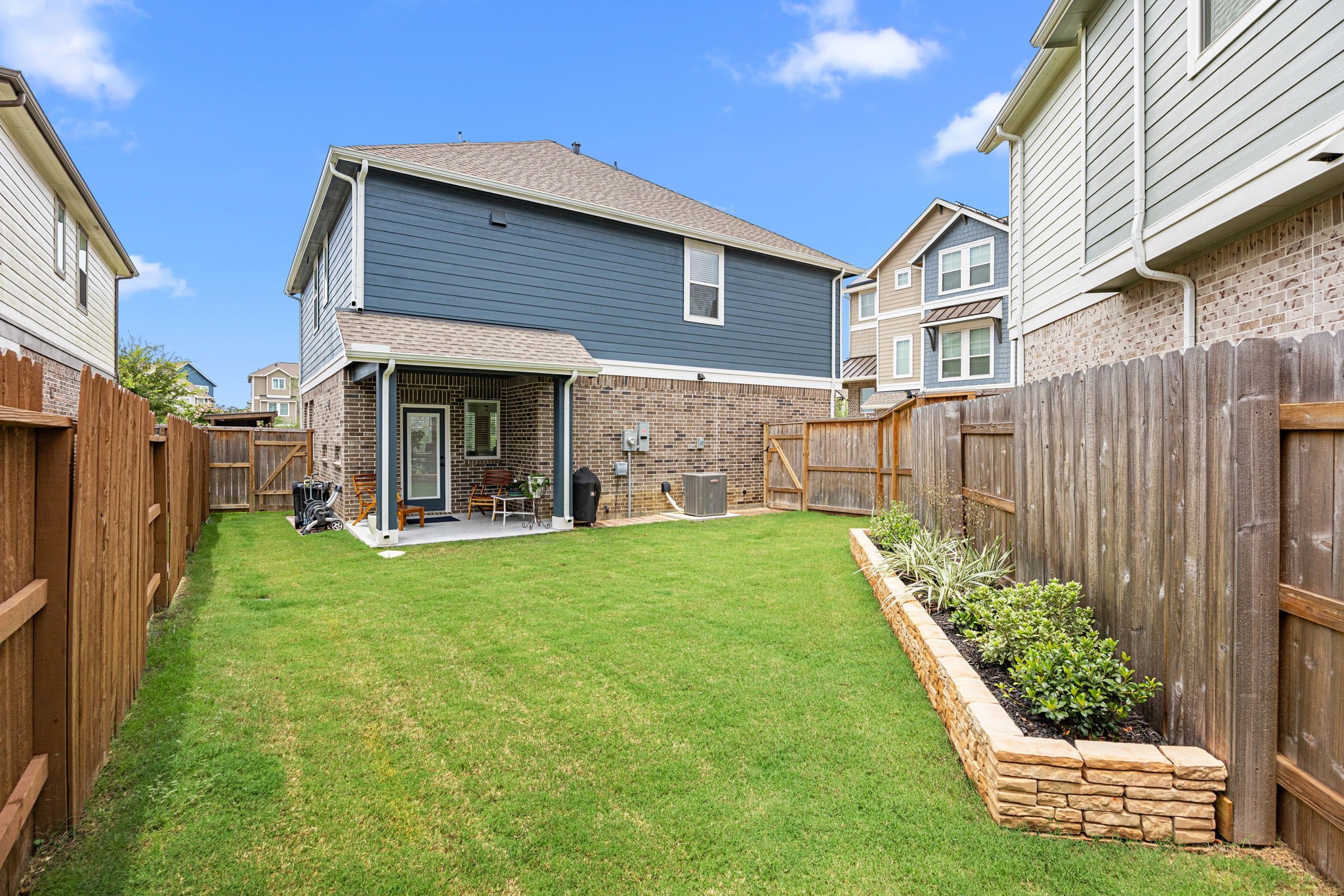 7618 Redbud Orchard Road Katy, TX 77493 - Photo 23 of 26 Autmatic sprinklers make maintaining your lawn and landscaping a breeze!