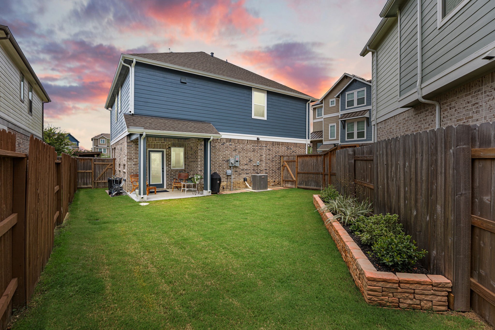 7618 Redbud Orchard Road Katy, TX 77493 - Photo 24 of 26 Enjoy your morning coffee or quiet evenings relaxing on your covered back patio. The current owners added professionally-installed flower beds and pavers from the side gate to the patio. Per Sellers, drainage in this yard is impeccable.