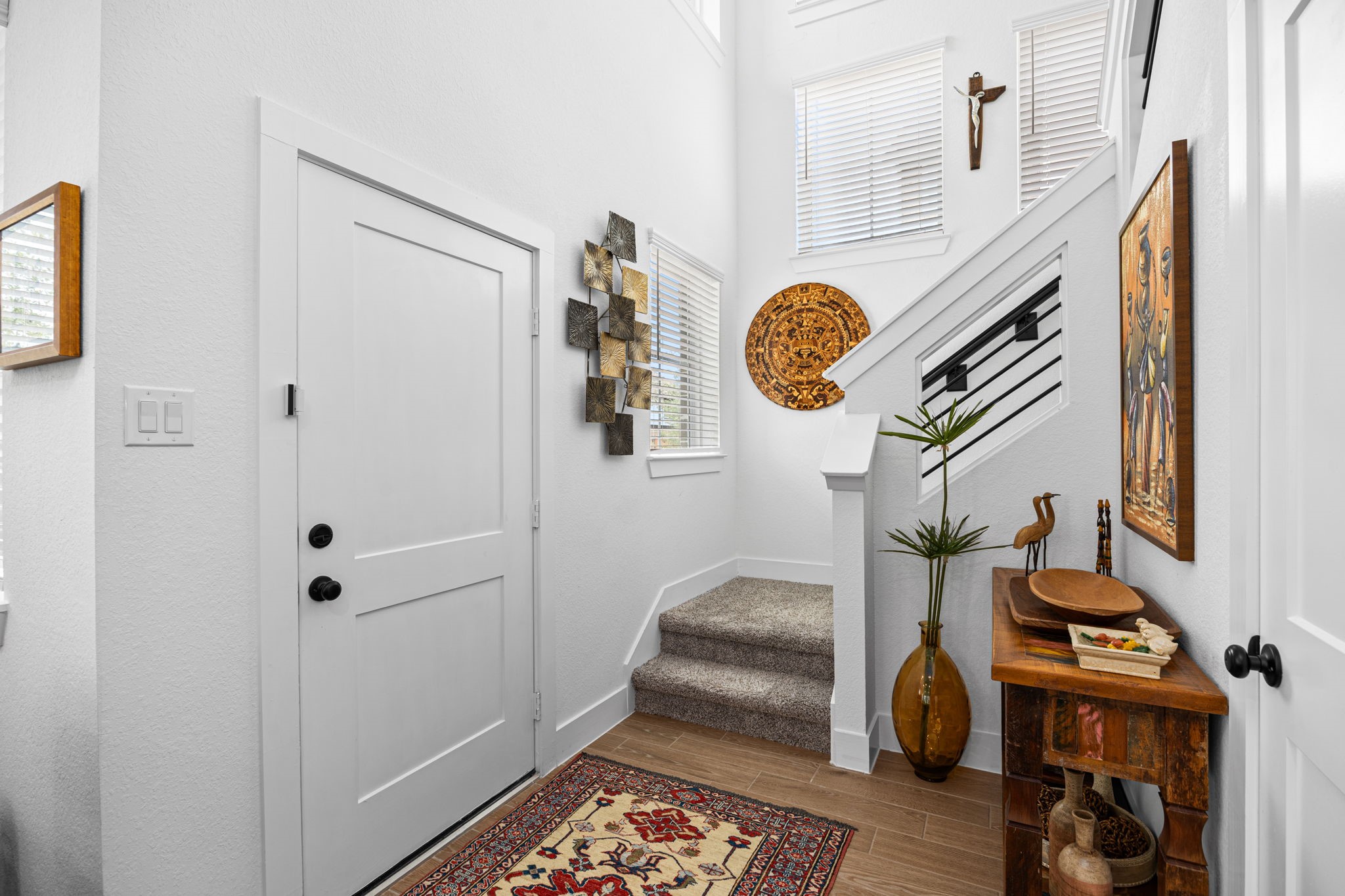 7618 Redbud Orchard Road Katy, TX 77493 - Photo 25 of 26 As you enter the home, you will be impressed by the light and bright interior with well-designed floorplan to maximize the functional space. The foyer makes an ideal spot to drop your keys and welcome guests.