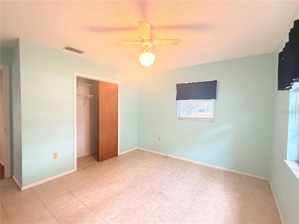 3410 Hartley Road Spring Hill, FL 34606 - Photo 20 of 29 a view of an empty room with a window