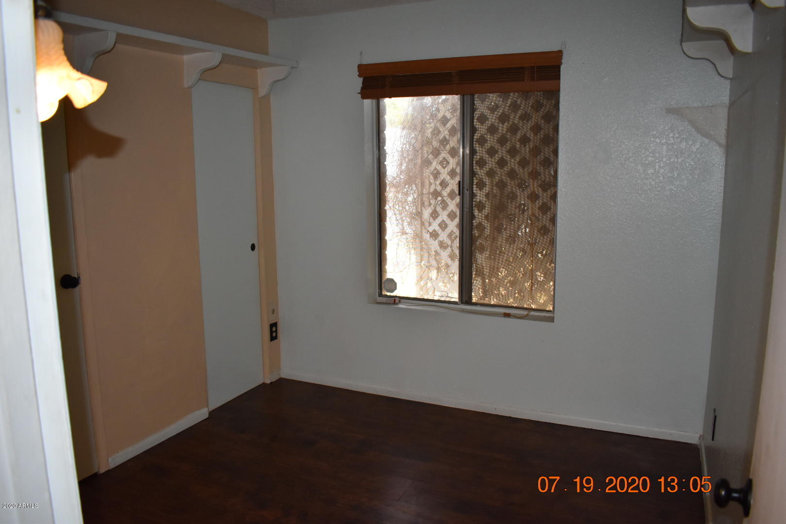 1507 West Escuda Road Phoenix, AZ 85027 - Photo 8 of 16 a view of an empty room with a window