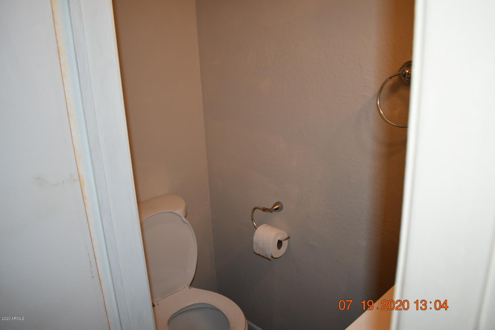 1507 West Escuda Road Phoenix, AZ 85027 - Photo 9 of 16 a close view of a toilet in bathroom