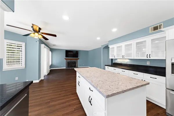 a kitchen with a stove and a sink