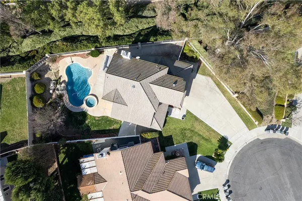 an aerial view of residential house with outdoor space