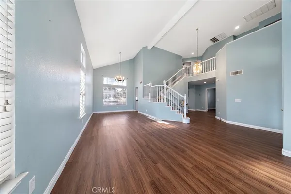 a view of gallery with wooden floor