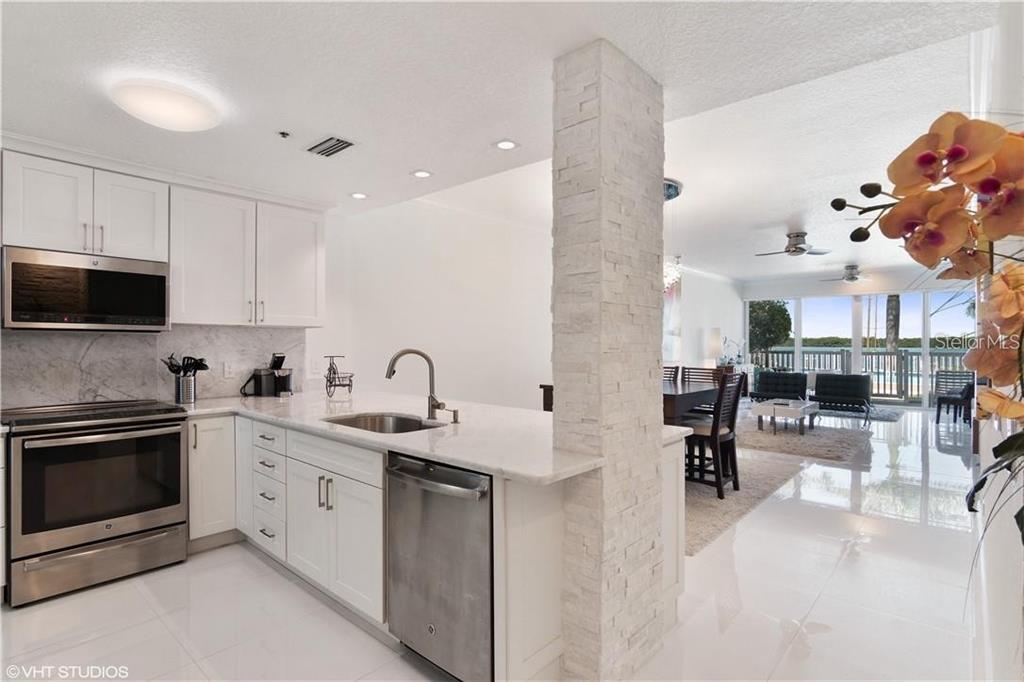 615 Dream Island Road, Unit 107 Longboat Key, FL 34228 - Photo 5 of 25 Gallery Image 5
