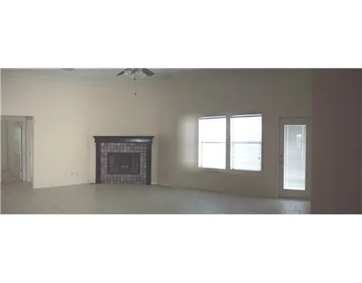 a black and white photo of a living room