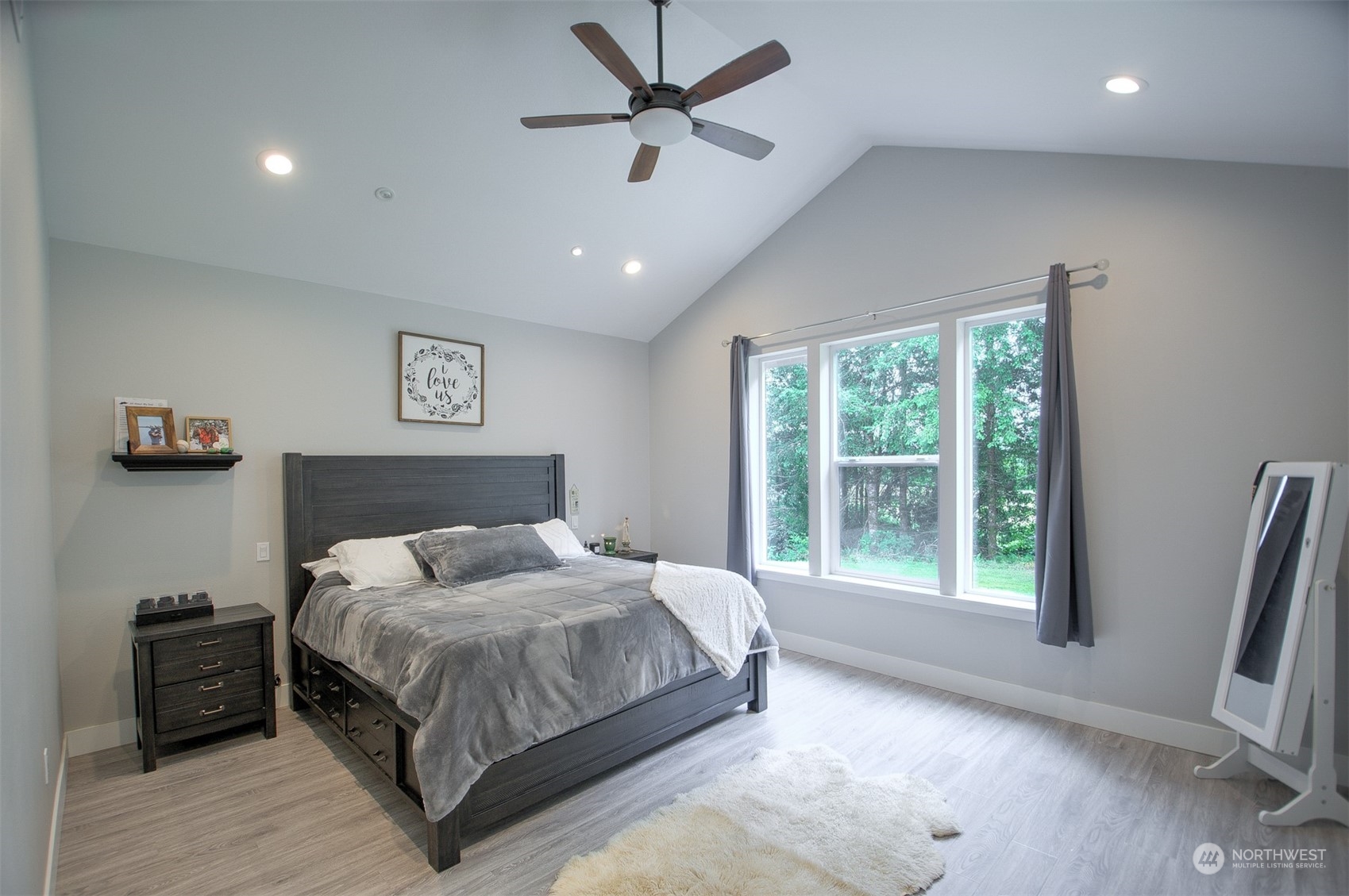 37 Richard Lane Elma, WA 98541 - Photo 11 of 26 a bedroom with a bed and a large window