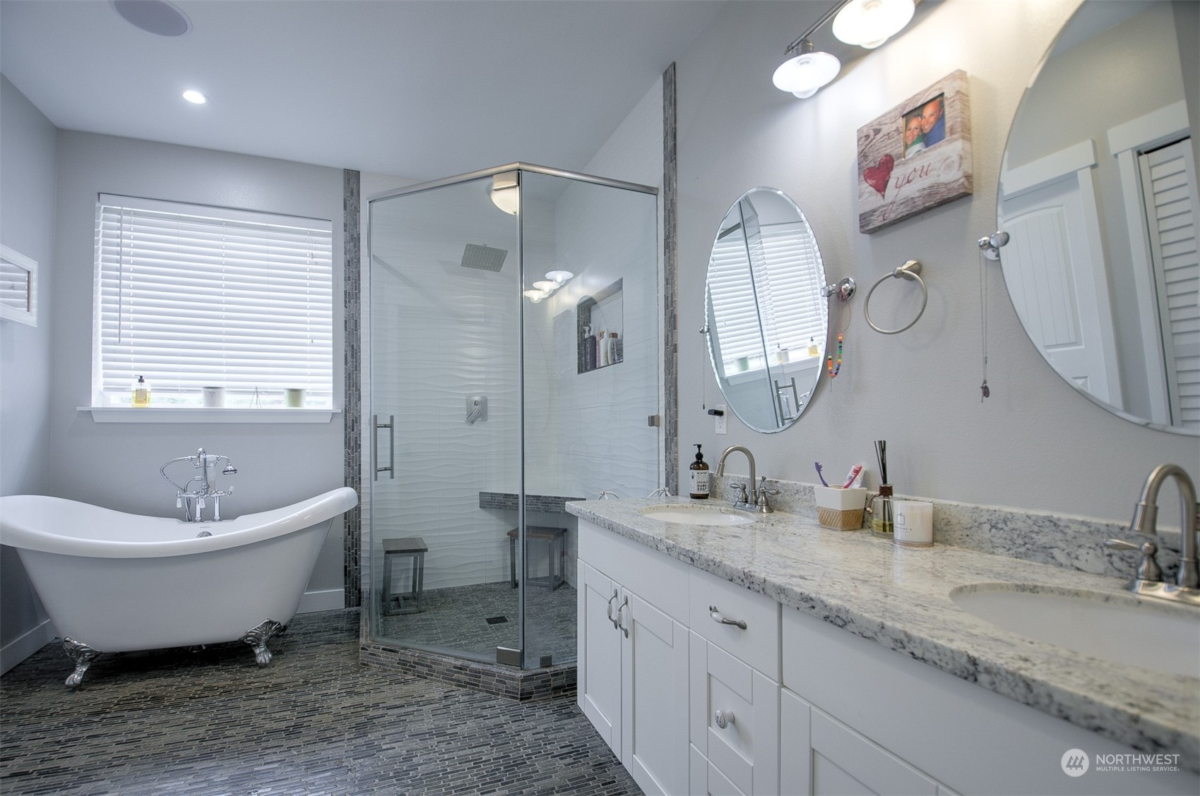 37 Richard Lane Elma, WA 98541 - Photo 12 of 26 a spacious bathroom with a double vanity sink mirror and bathtub