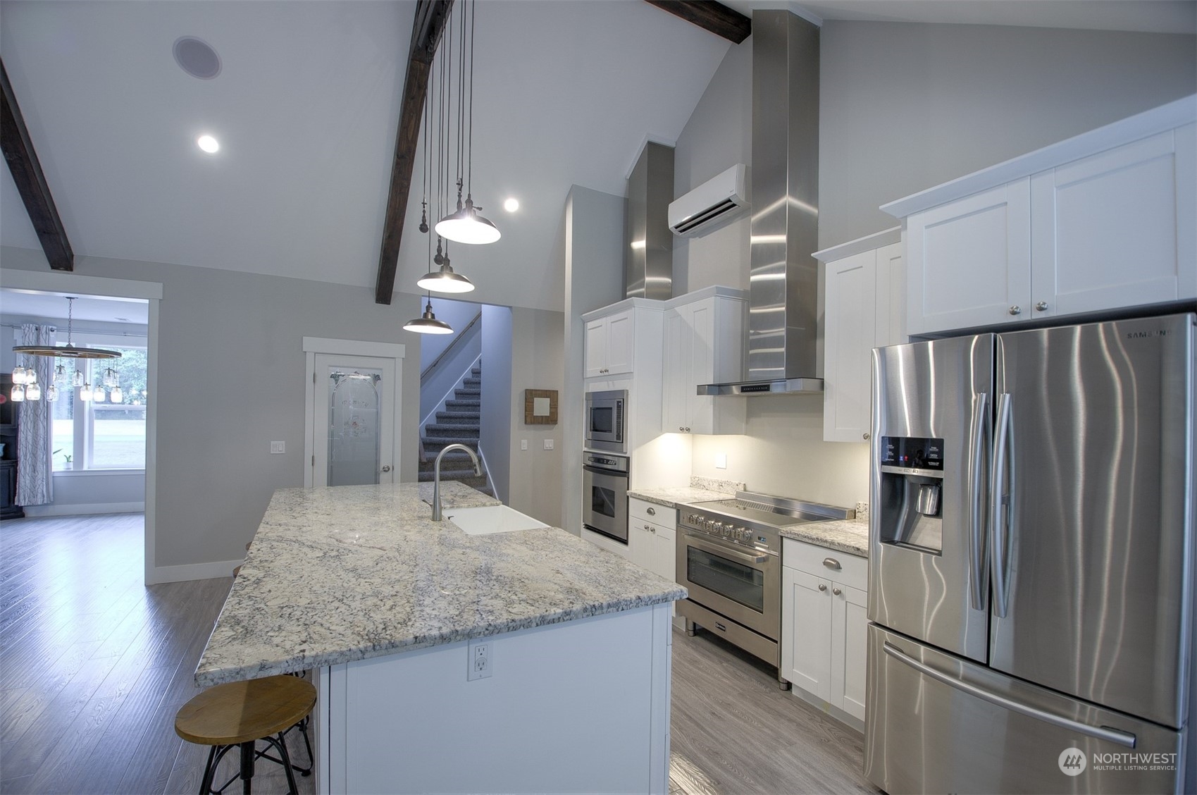 37 Richard Lane Elma, WA 98541 - Photo 8 of 26 a kitchen with stainless steel appliances granite countertop a refrigerator a sink and a stove