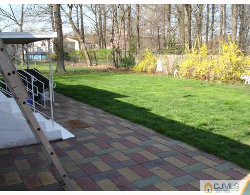 35 Ferris Road Edison, NJ 08817 - Photo 3 of 10 a view of a garden with a slide