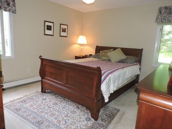 9 Hunter Hill Road Monson, MA 01057 - Photo 17 of 26 a bedroom with a bed and a window