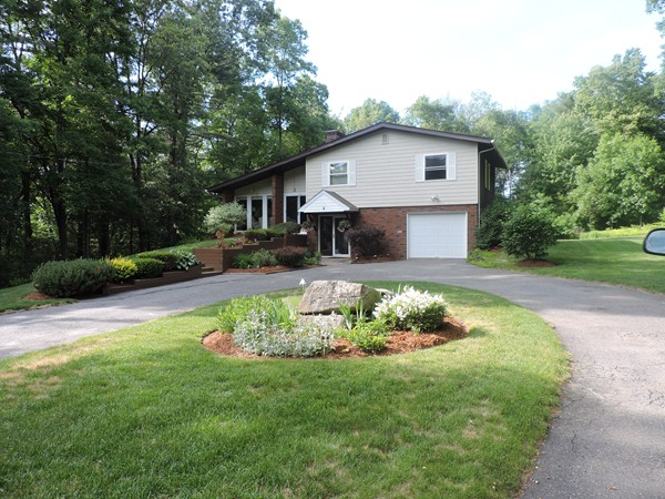 9 Hunter Hill Road Monson, MA 01057 - Photo 2 of 26 a house view with a garden space