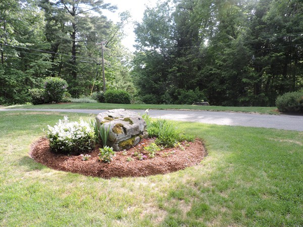 9 Hunter Hill Road Monson, MA 01057 - Photo 22 of 26 a view of a fire pit in a yard