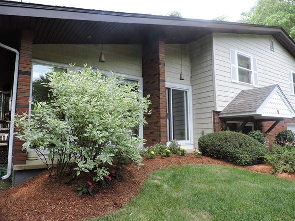 9 Hunter Hill Road Monson, MA 01057 - Photo 4 of 26 a front view of a house with garden