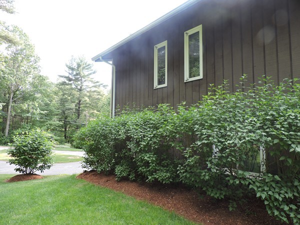 9 Hunter Hill Road Monson, MA 01057 - Photo 8 of 26 front view of a house with a yard