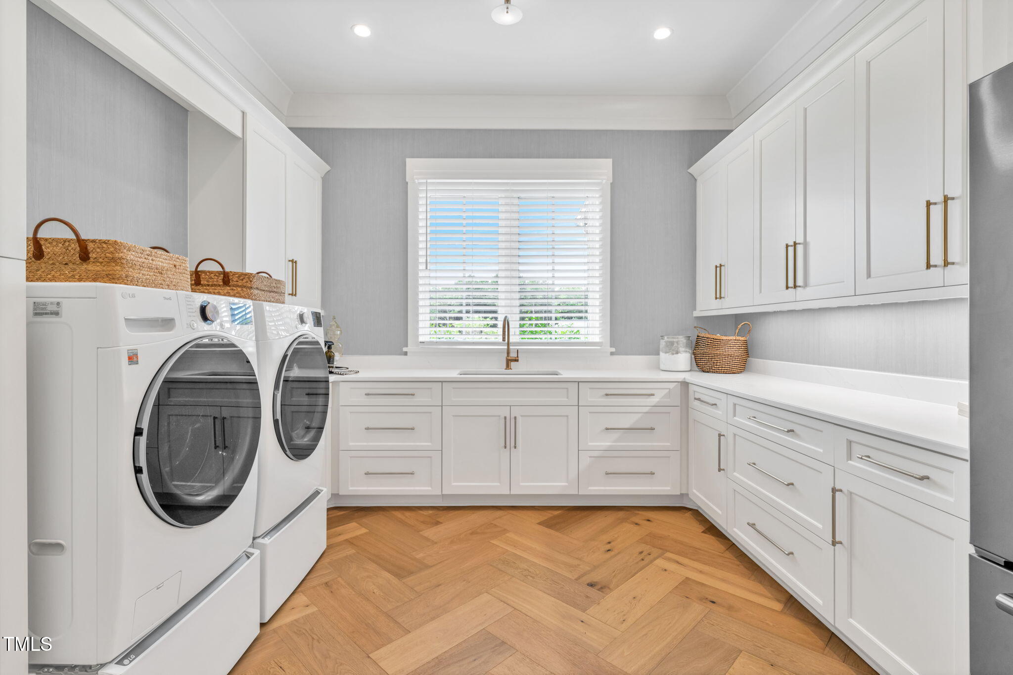 8917 Grand Highland Way Wake Forest, NC 27587 - Photo 24 of 80 a view of a kitchen with washer and dryer
