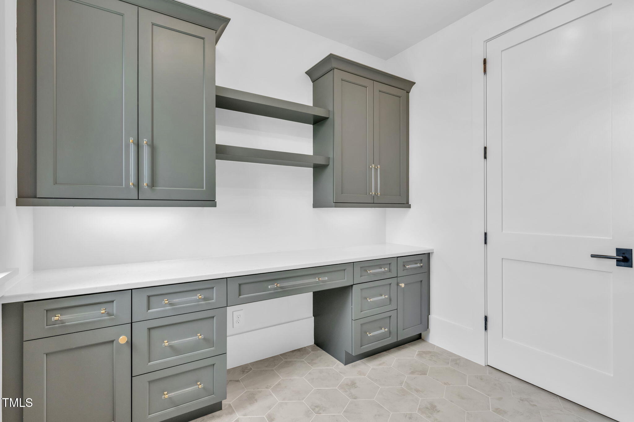 8917 Grand Highland Way Wake Forest, NC 27587 - Photo 42 of 80 a room with cabinets and dust bin