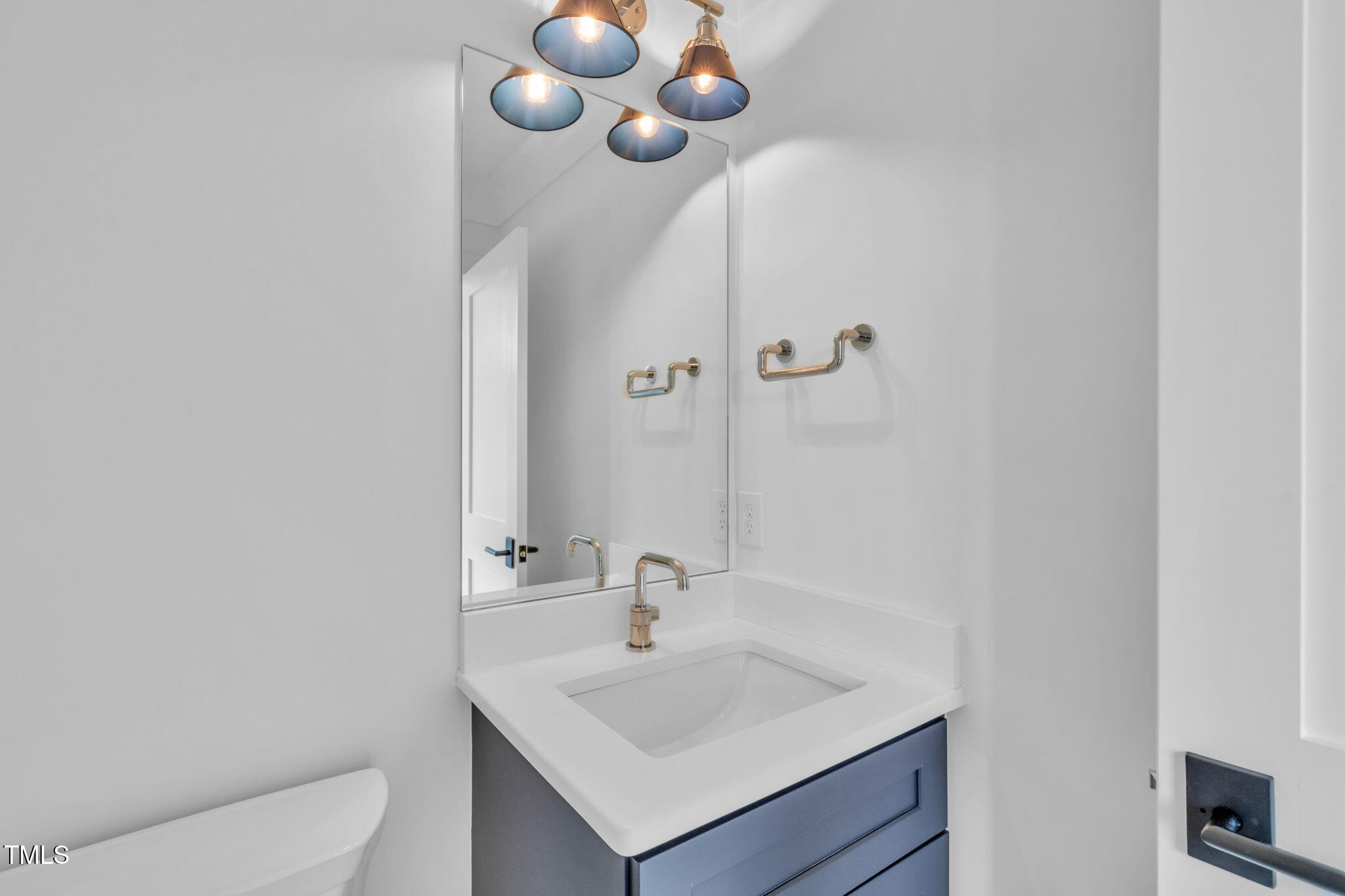 8917 Grand Highland Way Wake Forest, NC 27587 - Photo 46 of 80 a bathroom with a sink a toilet and shower