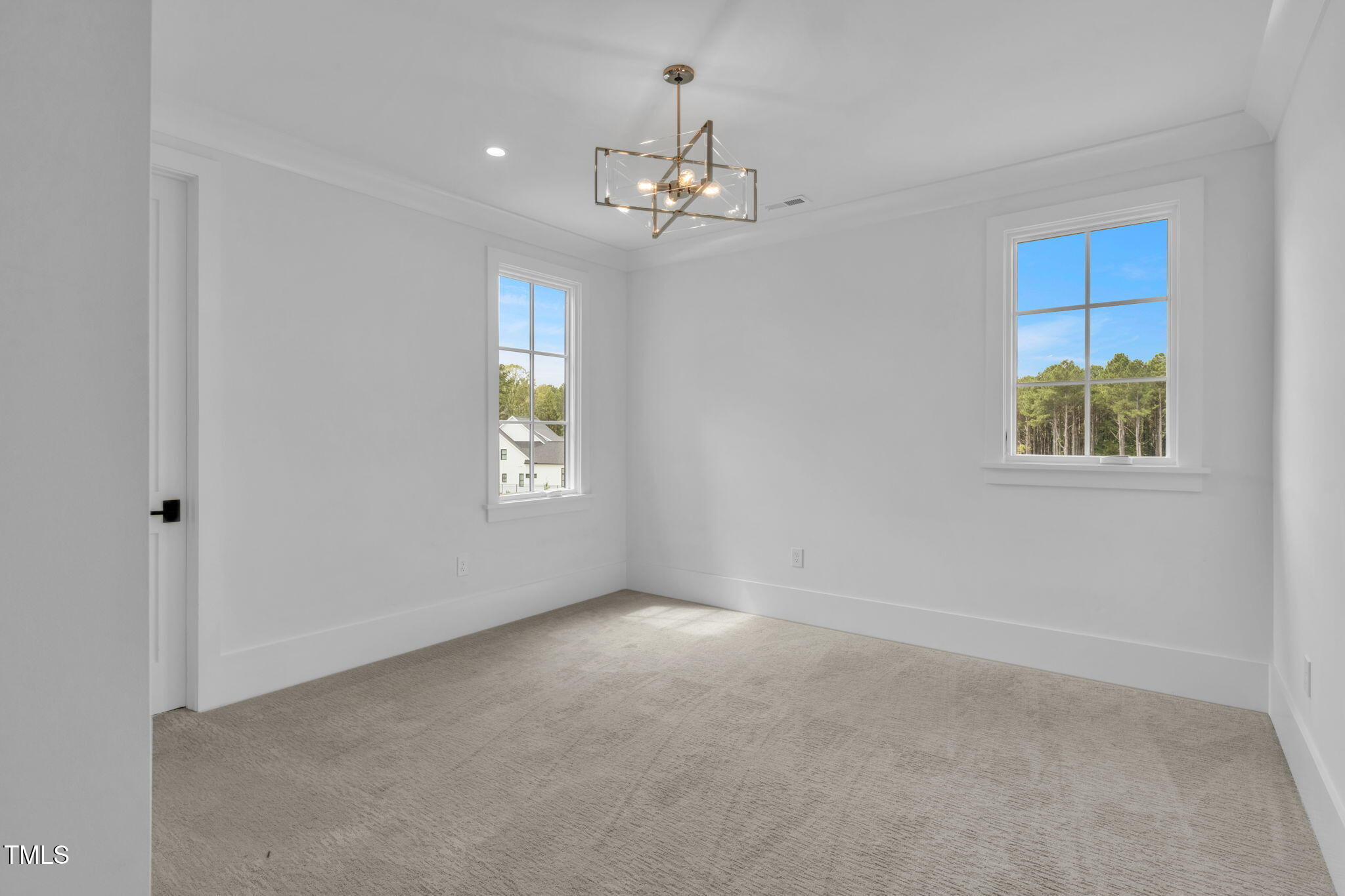 8917 Grand Highland Way Wake Forest, NC 27587 - Photo 47 of 80 a view of an empty room with a window