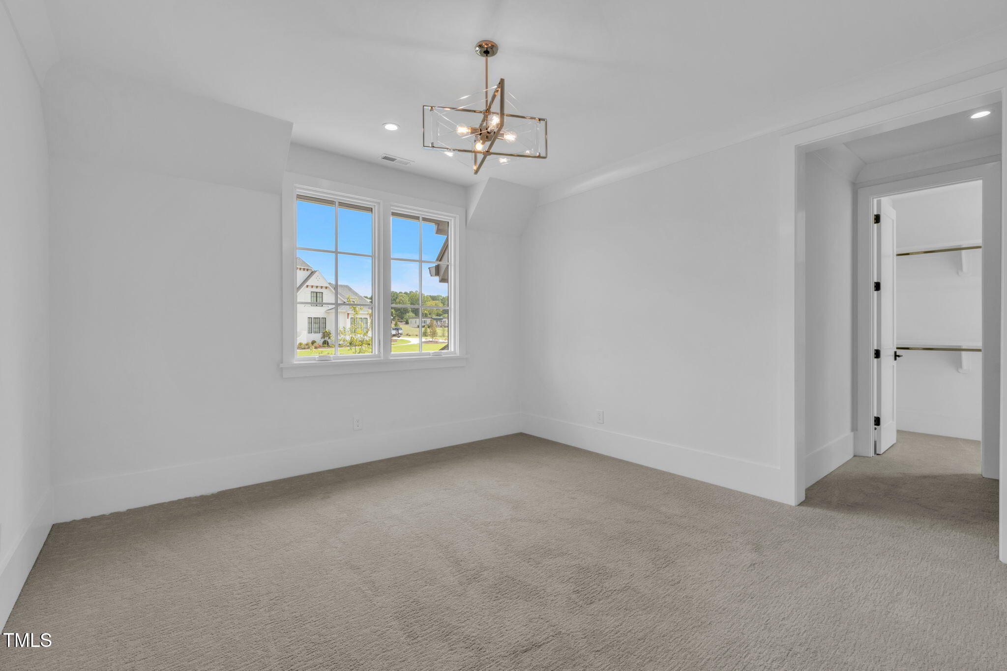 8917 Grand Highland Way Wake Forest, NC 27587 - Photo 56 of 80 a view of an empty room with a window