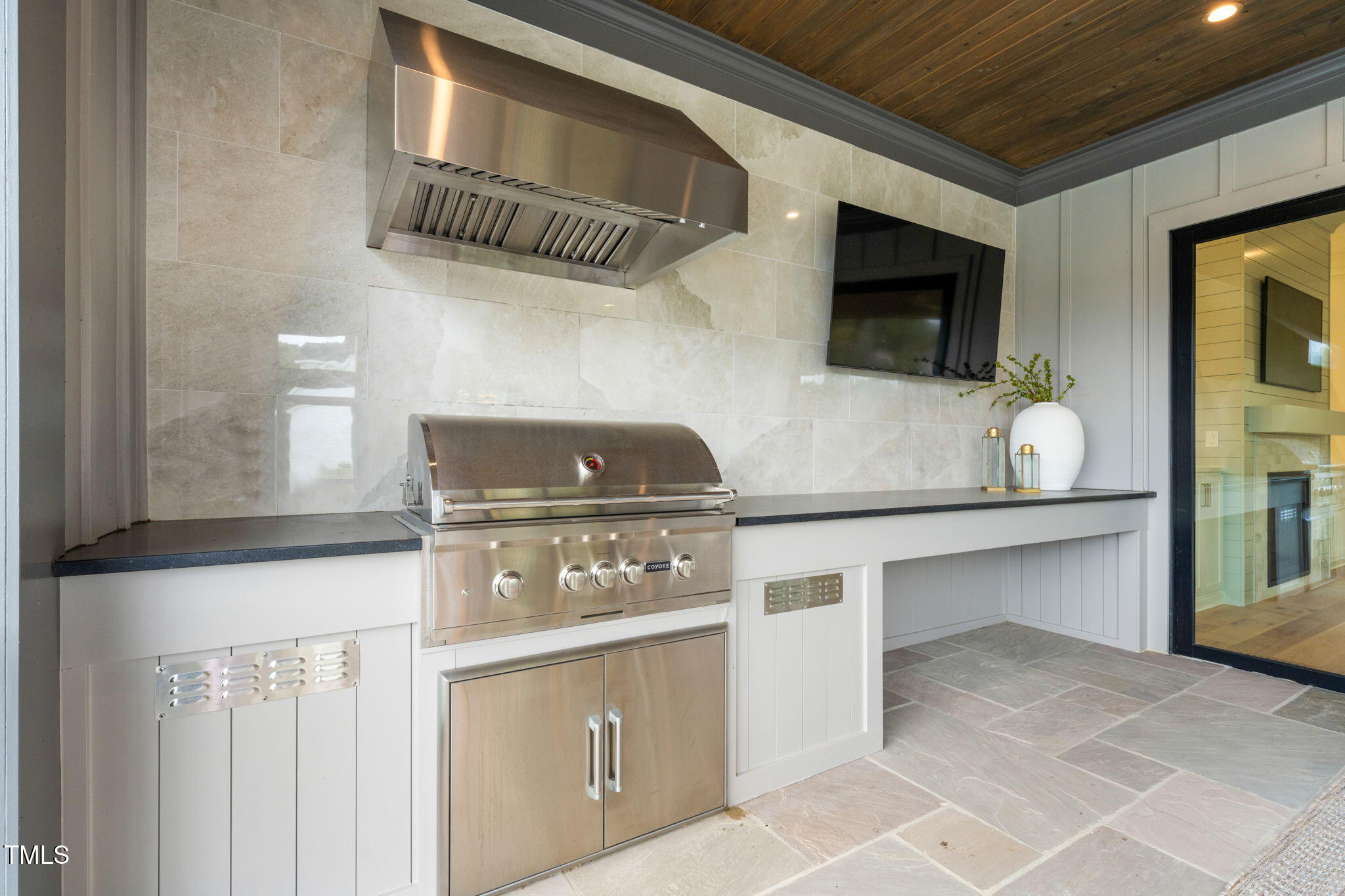 8917 Grand Highland Way Wake Forest, NC 27587 - Photo 61 of 80 a kitchen with a stove and a microwave