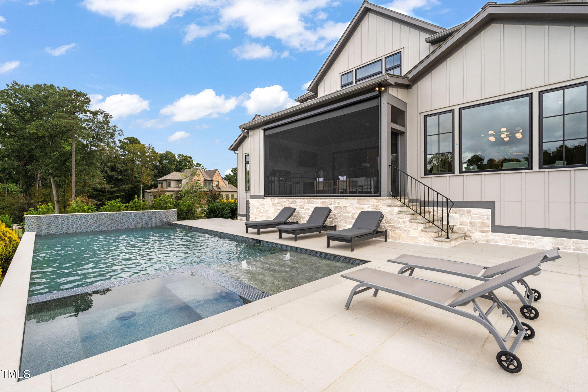 8917 Grand Highland Way Wake Forest, NC 27587 - Photo 67 of 80 a view of a patio with a table and chairs and couches
