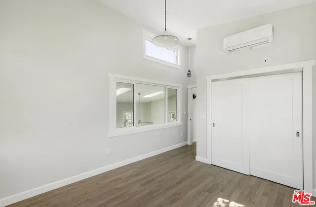 a bathroom with a toilet and a sink