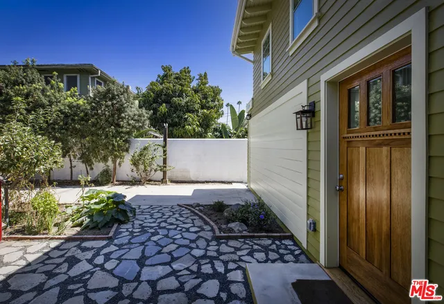 a view of a back yard of the house