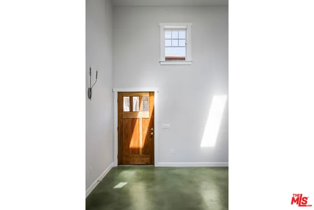 a view of kitchen with furniture and wooden floor