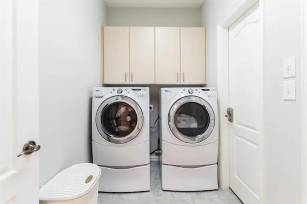 a bathroom with a toilet a sink and a shower