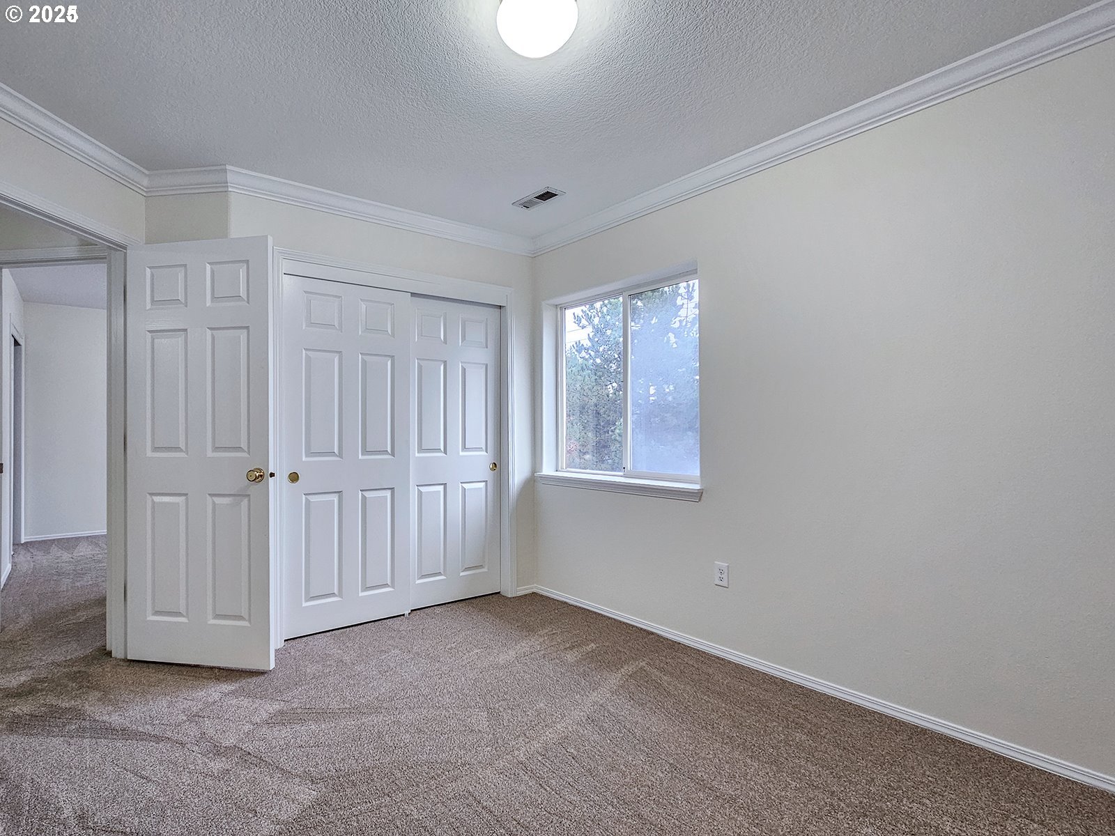 8754 Southwest Wakkila Terrace Beaverton, OR 97007 - Photo 14 of 19 an empty room with windows