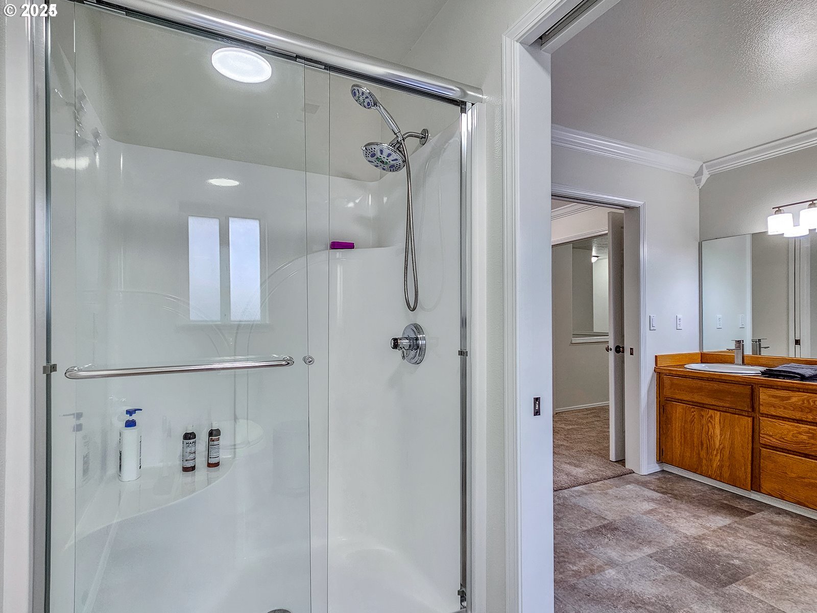 8754 Southwest Wakkila Terrace Beaverton, OR 97007 - Photo 6 of 19 a bathroom with a bathtub and a shower