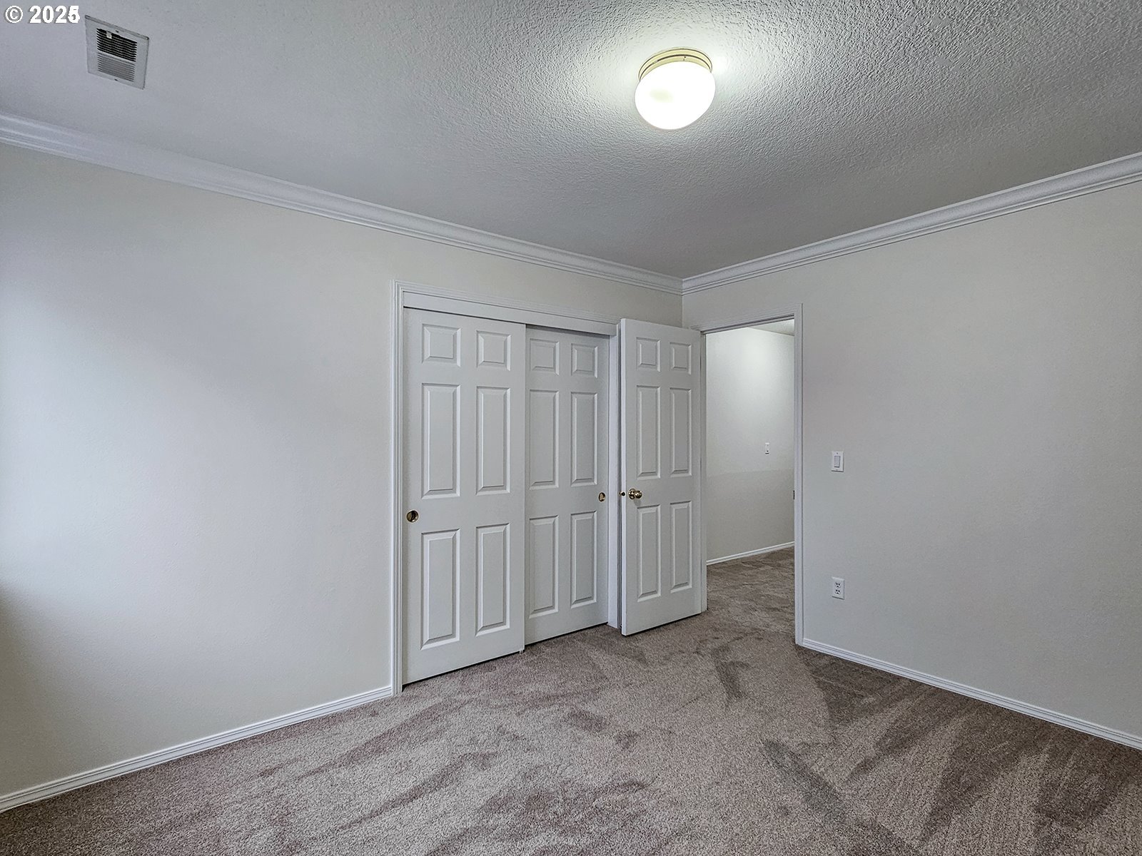 8754 Southwest Wakkila Terrace Beaverton, OR 97007 - Photo 9 of 19 an empty room with closet area
