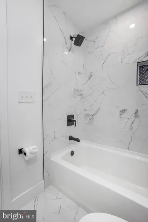 a bathroom with a bathtub