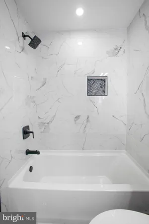 a bathroom with a bathtub