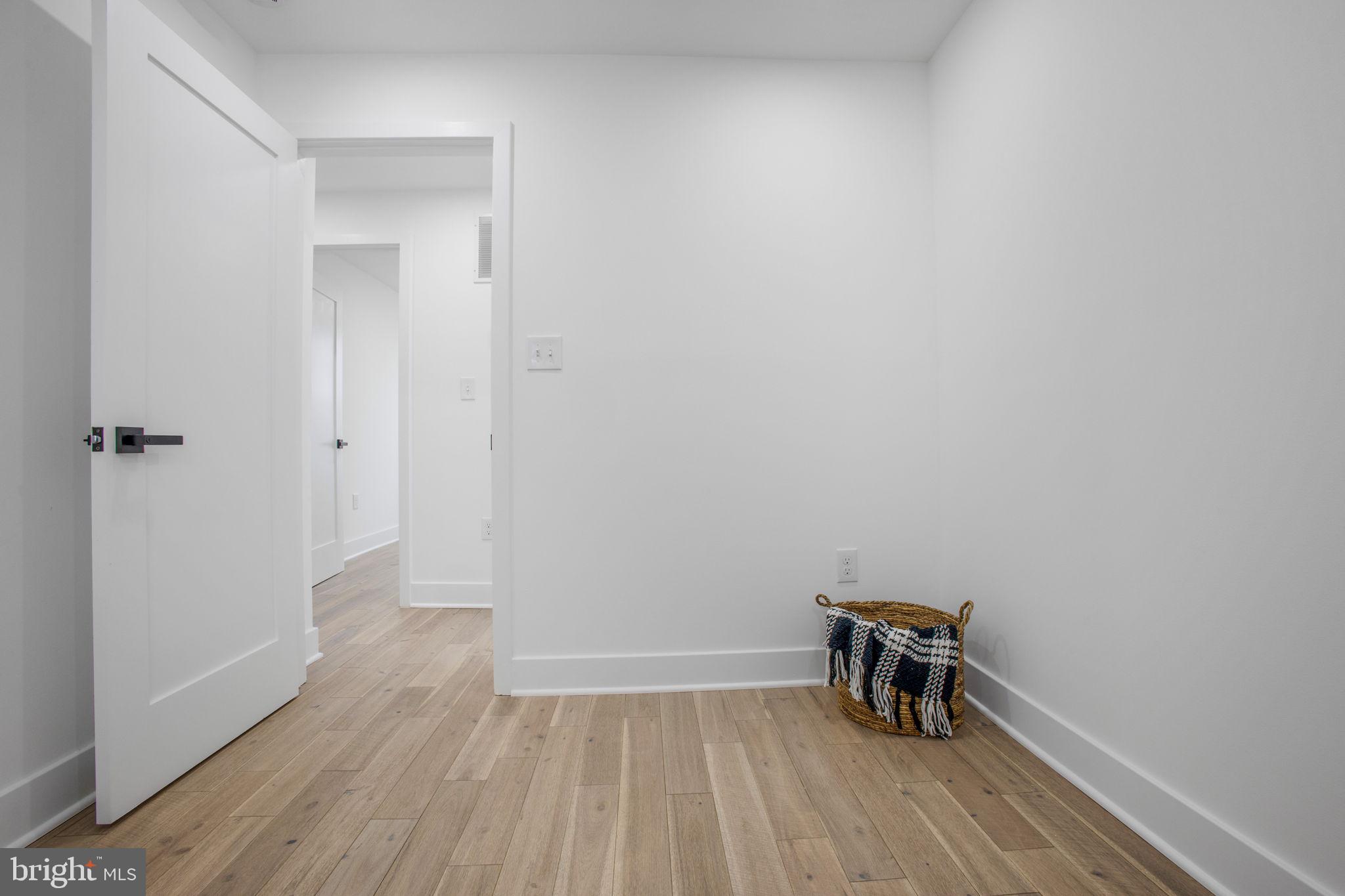 702 19th Street Northeast Washington, DC 20002 - Photo 27 of 38 a view of room with wooden floor and a window